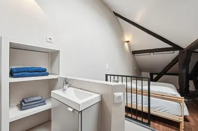 Un ou plusieurs lits dans un hébergement de l'établissement Orsay Invalides - Lille 1bdr by B'Your Home