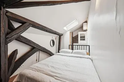 Un ou plusieurs lits dans un hébergement de l'établissement Orsay Invalides - Lille 1bdr by B'Your Home