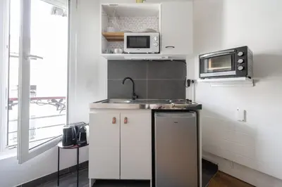 Cuisine ou kitchenette dans l'établissement Studio Ginoux - Welkeys
