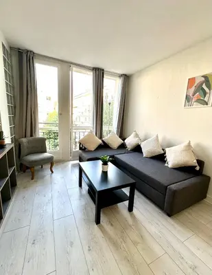 Coin salon dans l'établissement Appart ensoleillé à Boulogne Billancourt