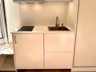 Cuisine ou kitchenette dans l'établissement Studio Metro Paris La-defense