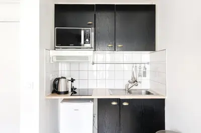 Cuisine ou kitchenette dans l'établissement Bluestay 237 - Superbe Appartement à Paris