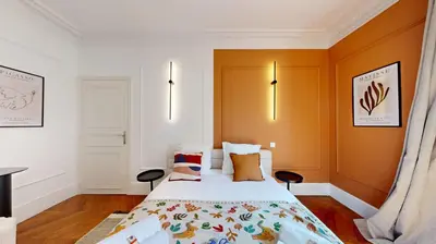 Un ou plusieurs lits dans un hébergement de l'établissement Bluestay 285 - Charmant Appartement à Paris