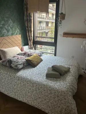 Un ou plusieurs lits dans un hébergement de l'établissement Les Chambres de David