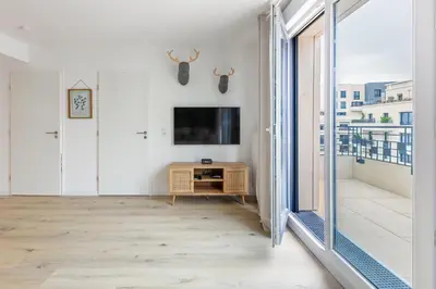 Télévision ou salle de divertissement dans l'établissement Refuge Naturel au Cœur des Docks by So Homy - 1 Bed Room 4 PAX