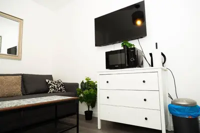 Télévision ou salle de divertissement dans l'établissement Charment studio stade de France 18 pour 4 personnes