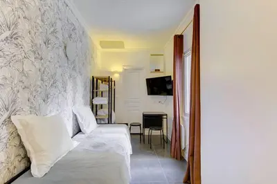 Un ou plusieurs lits dans un hébergement de l'établissement Bluestay 187 - Charmant studio à Paris