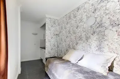 Un ou plusieurs lits dans un hébergement de l'établissement Bluestay 187 - Charmant studio à Paris