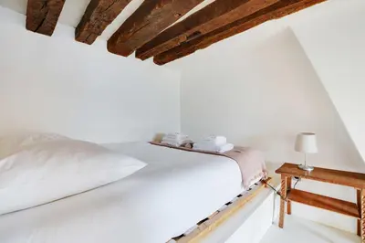Un ou plusieurs lits dans un hébergement de l'établissement Modern flat - 1BD-4P - Arts et Métiers