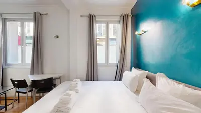 Un ou plusieurs lits dans un hébergement de l'établissement Bluestay 235 - Superbe appartement à Paris