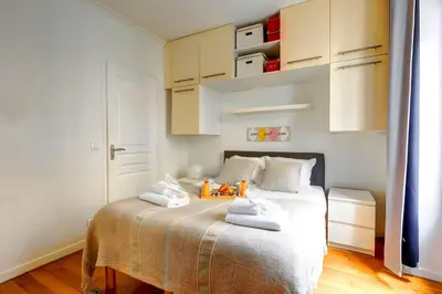 Un ou plusieurs lits dans un hébergement de l'établissement Bluestay 236 - Superbe appartement à Paris