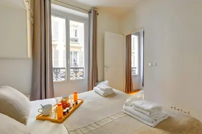 Un ou plusieurs lits dans un hébergement de l'établissement Bluestay 236 - Superbe appartement à Paris
