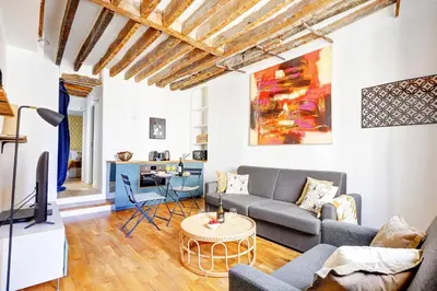 Coin salon dans l'établissement Bluestay 283 - Superbe Appartement dans le Marais