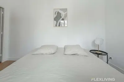 Un ou plusieurs lits dans un hébergement de l'établissement Flexliving - room - Saint Martin