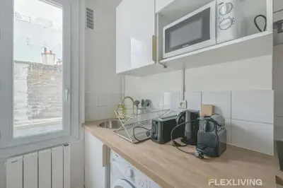 Cuisine ou kitchenette dans l'établissement Flexliving - whole flat - Saint Martin