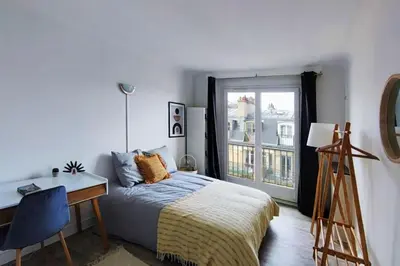 Un ou plusieurs lits dans un hébergement de l'établissement Flexliving - whole flat - Villon