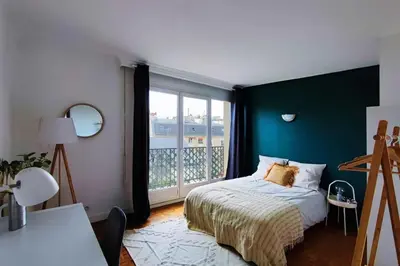 Un ou plusieurs lits dans un hébergement de l'établissement Flexliving - whole flat - Villon