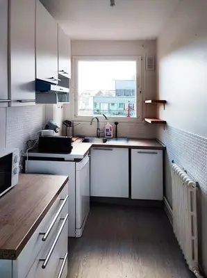Cuisine ou kitchenette dans l'établissement Flexliving - whole flat - Villon