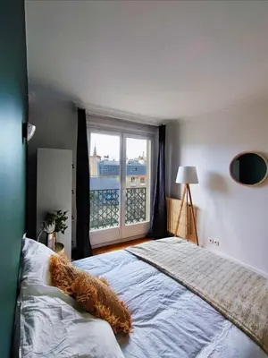 Un ou plusieurs lits dans un hébergement de l'établissement Flexliving - room - Villon