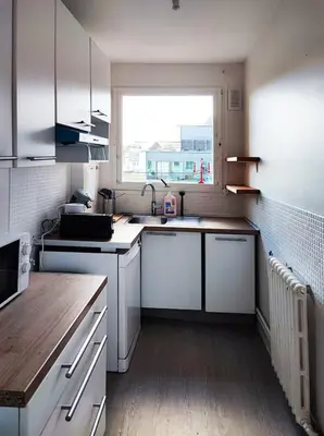 Cuisine ou kitchenette dans l'établissement Flexliving - room - Villon