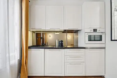 Cuisine ou kitchenette dans l'établissement Bluestay 114 : Superbe appartement à Bastille
