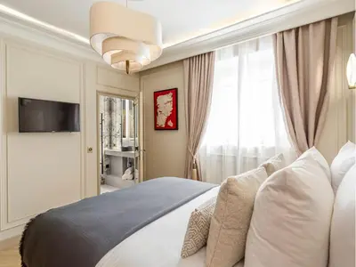 Un ou plusieurs lits dans un hébergement de l'établissement Merveil - Luxury Suite - Marais - Turbigo II