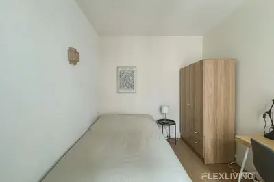 Un ou plusieurs lits dans un hébergement de l'établissement Flexliving - Room - Mesnil