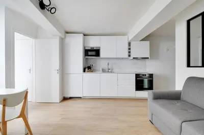 Cuisine ou kitchenette dans l'établissement Flexliving - Studio - Saint Antoine