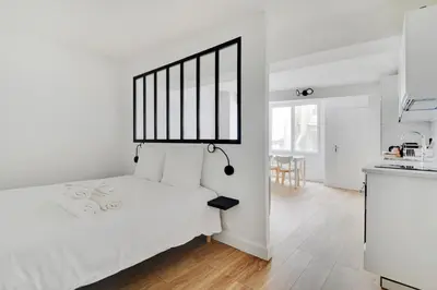 Un ou plusieurs lits dans un hébergement de l'établissement Flexliving - Studio - Saint Antoine