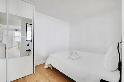 Un ou plusieurs lits dans un hébergement de l'établissement Flexliving - Studio - Saint Antoine
