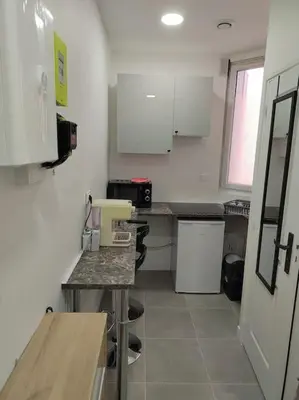 Cuisine ou kitchenette dans l'établissement Studio à deux pas du métro
