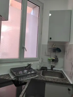 Cuisine ou kitchenette dans l'établissement Studio à deux pas du métro