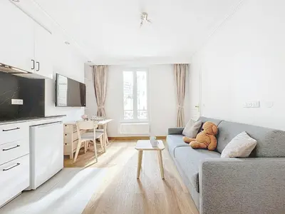 Télévision ou salle de divertissement dans l'établissement 122 - Luxueux pied-à-terre parisien