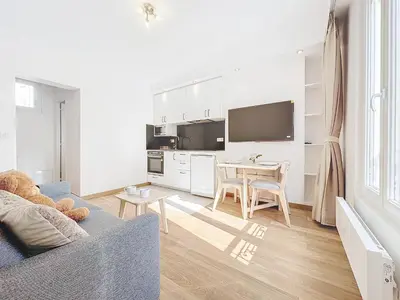 Télévision ou salle de divertissement dans l'établissement 122 - Luxueux pied-à-terre parisien