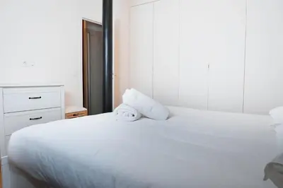 Un ou plusieurs lits dans un hébergement de l'établissement Loft Petion Dog friendly