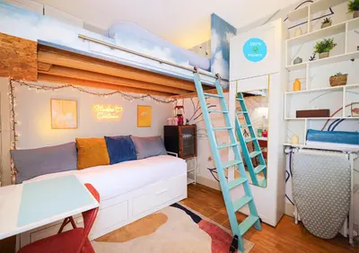 Un ou plusieurs lits dans un hébergement de l'établissement La chambre COCTEAU