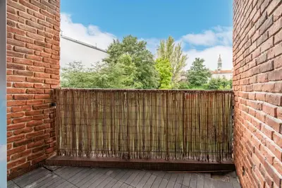 Balcon ou terrasse dans l'établissement Le Grand Blanqui - Face RER B - Free Parking