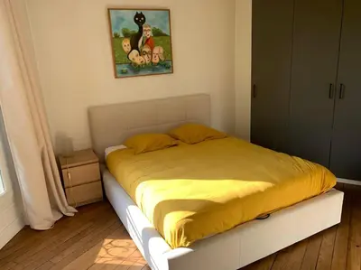 Un ou plusieurs lits dans un hébergement de l'établissement Appartement Haussmanien au coeur du village Montmartre !