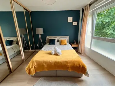 Un ou plusieurs lits dans un hébergement de l'établissement Appartement Saint-Denis proche Stade de France