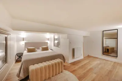 Un ou plusieurs lits dans un hébergement de l'établissement Charming flat - 1BD6P - Palais Garnier