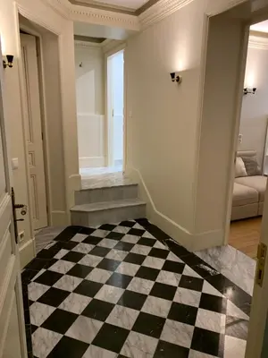 Un ou plusieurs lits dans un hébergement de l'établissement Appartement Tour Eiffel Invalides 7e G