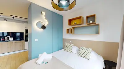 Un ou plusieurs lits dans un hébergement de l'établissement Bluestay 85 - Superbe appartement à Paris