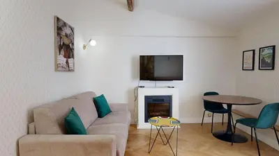 Télévision ou salle de divertissement dans l'établissement Bluestay 115 - Superbe Appartement à Paris