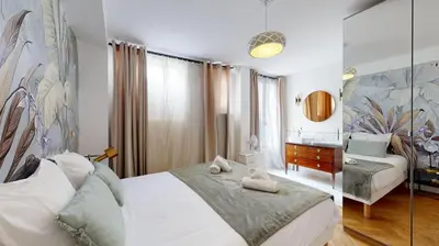 Un ou plusieurs lits dans un hébergement de l'établissement Bluestay 115 - Superbe Appartement à Paris