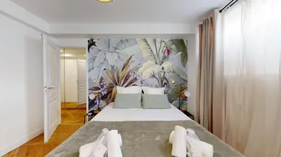 Un ou plusieurs lits dans un hébergement de l'établissement Bluestay 115 - Superbe Appartement à Paris