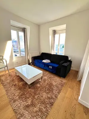 Coin salon dans l'établissement Cosy 2 Person Studio - Near Eiffel Tower