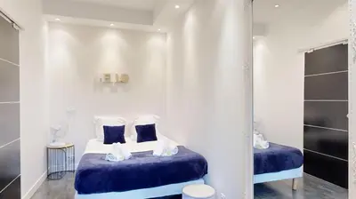 Un ou plusieurs lits dans un hébergement de l'établissement Bluestay 63 - Appartement cozy, Paris centre