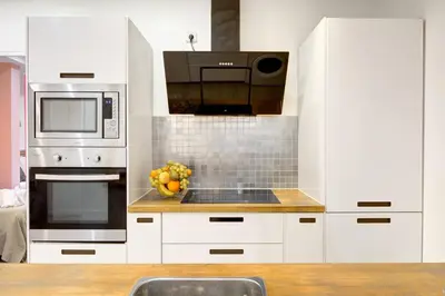 Cuisine ou kitchenette dans l'établissement Bluestay 149 - Spacieux appartement Paris centre