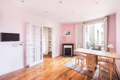 Télévision ou salle de divertissement dans l'établissement Magnifique appartement Paris