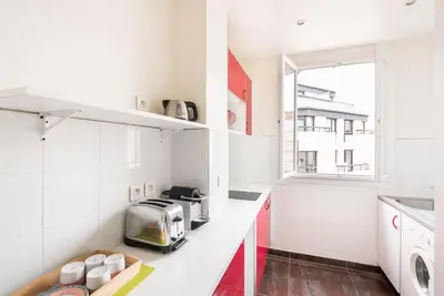 Cuisine ou kitchenette dans l'établissement Magnifique appartement Paris